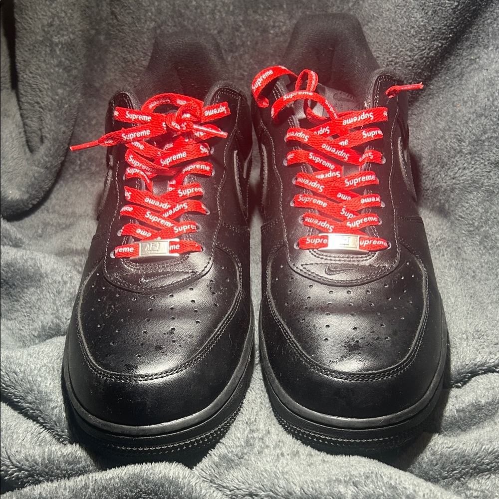 Supreme Black Sneakers with Red Laces